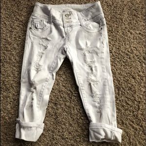 White distressed capris